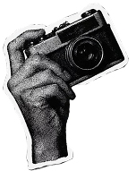 Hands holding a film camera